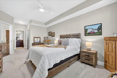 2305-15 Sunset Square, Cochrane, AB - Indoor Photo Showing Bedroom