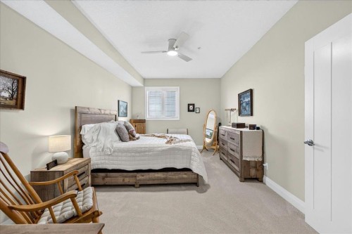 2305-15 Sunset Square, Cochrane, AB - Indoor Photo Showing Bedroom