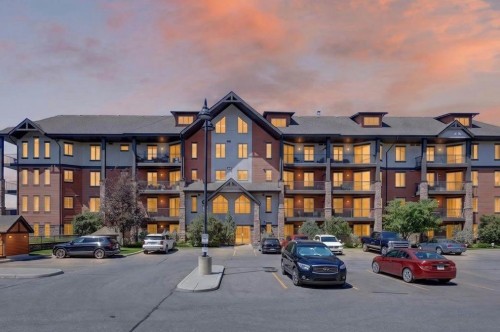 2305-15 Sunset Square, Cochrane, AB - Outdoor With Balcony With Facade