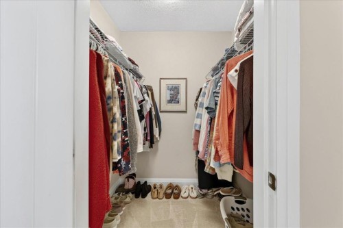 2305-15 Sunset Square, Cochrane, AB - Indoor With Storage