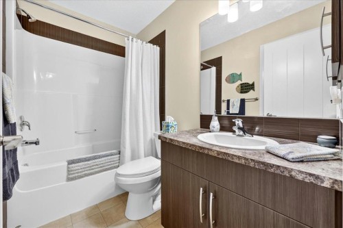 2305-15 Sunset Square, Cochrane, AB - Indoor Photo Showing Bathroom