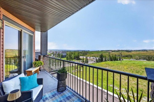 2305-15 Sunset Square, Cochrane, AB - Outdoor With Exterior
