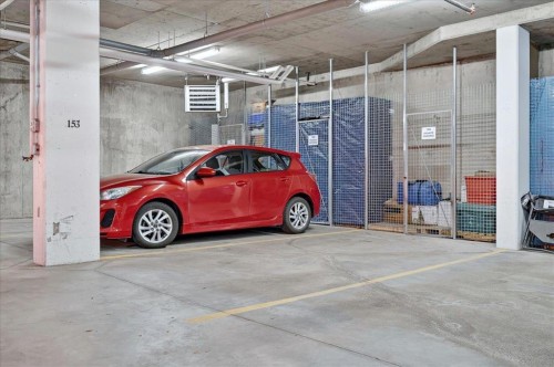 2305-15 Sunset Square, Cochrane, AB - Indoor Photo Showing Garage