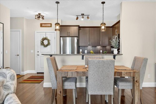 2305-15 Sunset Square, Cochrane, AB - Indoor Photo Showing Dining Room