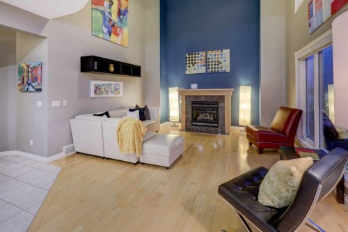 40 Arbour Estates Green Nw, Calgary, AB - Indoor Photo Showing Living Room With Fireplace