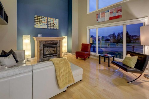 40 Arbour Estates Green Nw, Calgary, AB - Indoor Photo Showing Living Room With Fireplace
