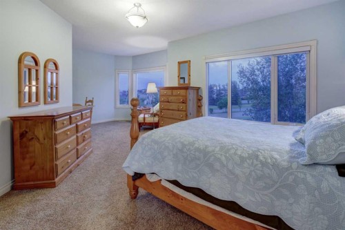40 Arbour Estates Green Nw, Calgary, AB - Indoor Photo Showing Bedroom