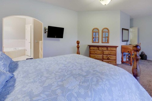 40 Arbour Estates Green Nw, Calgary, AB - Indoor Photo Showing Bedroom