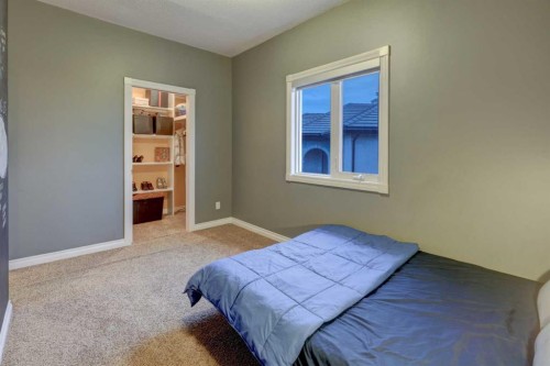 40 Arbour Estates Green Nw, Calgary, AB - Indoor Photo Showing Bedroom