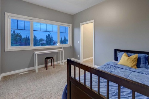 40 Arbour Estates Green Nw, Calgary, AB - Indoor Photo Showing Bedroom