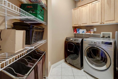 40 Arbour Estates Green Nw, Calgary, AB - Indoor Photo Showing Laundry Room