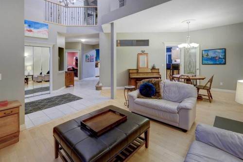 40 Arbour Estates Green Nw, Calgary, AB - Indoor Photo Showing Living Room