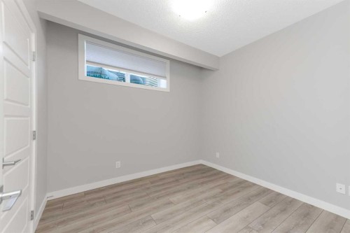 226 Ambleton Drive Nw, Calgary, AB - Indoor Photo Showing Other Room