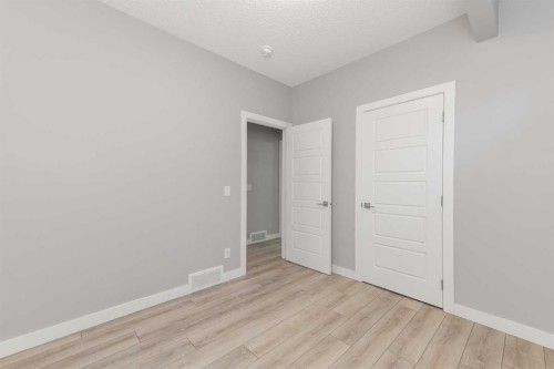 226 Ambleton Drive Nw, Calgary, AB - Indoor Photo Showing Other Room