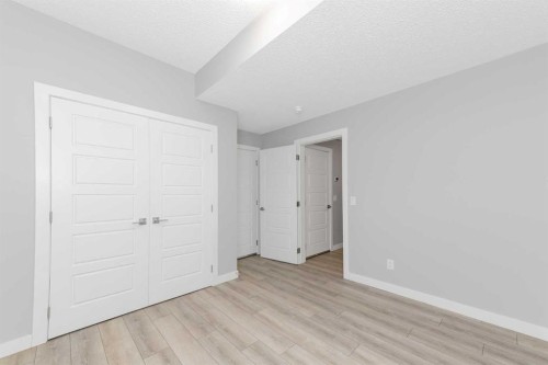 226 Ambleton Drive Nw, Calgary, AB - Indoor Photo Showing Other Room