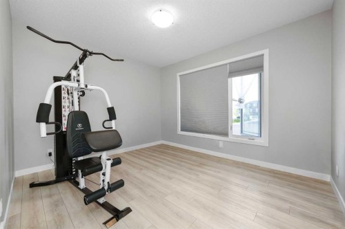 226 Ambleton Drive Nw, Calgary, AB - Indoor Photo Showing Gym Room