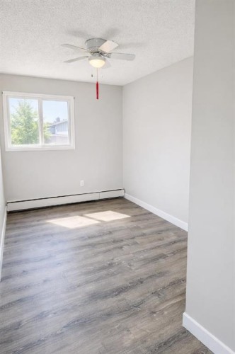 206-101 Big Hill Way Se, Airdrie, AB - Indoor Photo Showing Other Room