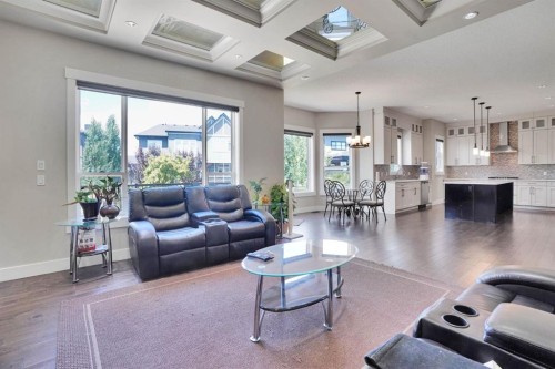 113 Kinniburgh Bay, Chestermere, AB - Indoor Photo Showing Living Room