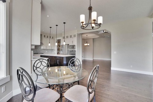 113 Kinniburgh Bay, Chestermere, AB - Indoor Photo Showing Dining Room