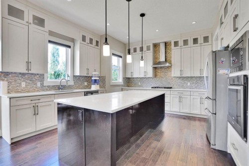 113 Kinniburgh Bay, Chestermere, AB - Indoor Photo Showing Kitchen With Upgraded Kitchen