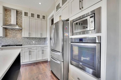 113 Kinniburgh Bay, Chestermere, AB - Indoor Photo Showing Kitchen With Upgraded Kitchen