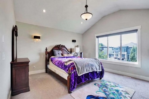 113 Kinniburgh Bay, Chestermere, AB - Indoor Photo Showing Bedroom