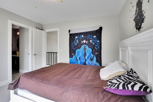 113 Kinniburgh Bay, Chestermere, AB - Indoor Photo Showing Bedroom