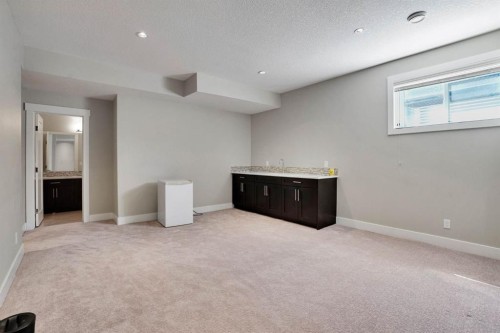113 Kinniburgh Bay, Chestermere, AB - Indoor Photo Showing Other Room