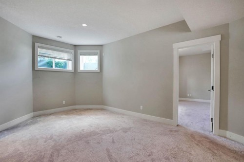 113 Kinniburgh Bay, Chestermere, AB - Indoor Photo Showing Other Room