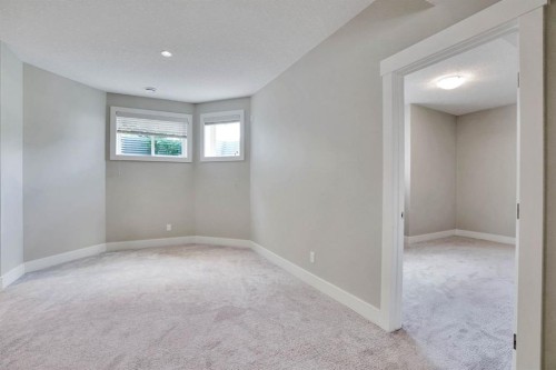113 Kinniburgh Bay, Chestermere, AB - Indoor Photo Showing Other Room