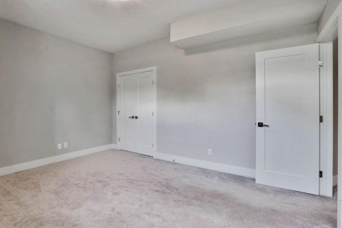 113 Kinniburgh Bay, Chestermere, AB - Indoor Photo Showing Other Room