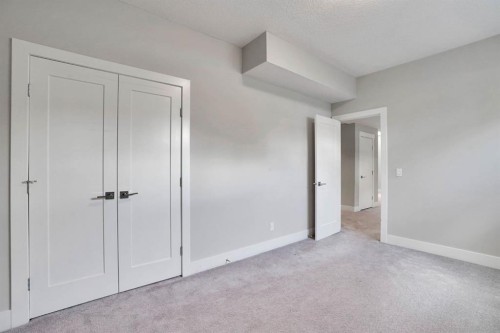 113 Kinniburgh Bay, Chestermere, AB - Indoor Photo Showing Other Room