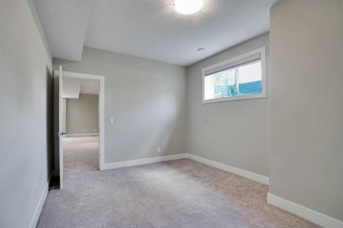 113 Kinniburgh Bay, Chestermere, AB - Indoor Photo Showing Other Room