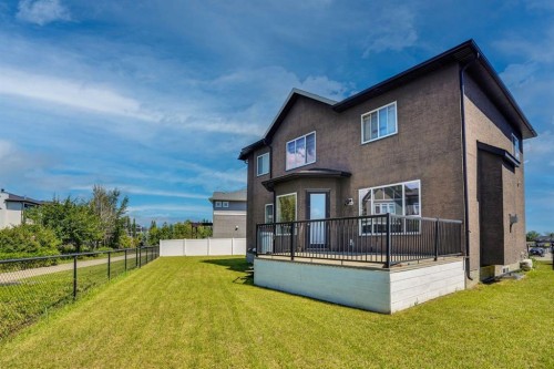 113 Kinniburgh Bay, Chestermere, AB - Outdoor With Deck Patio Veranda