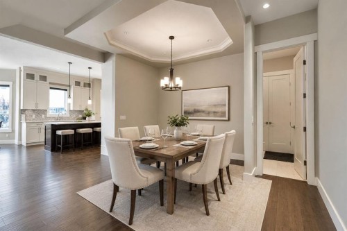 113 Kinniburgh Bay, Chestermere, AB - Indoor Photo Showing Dining Room