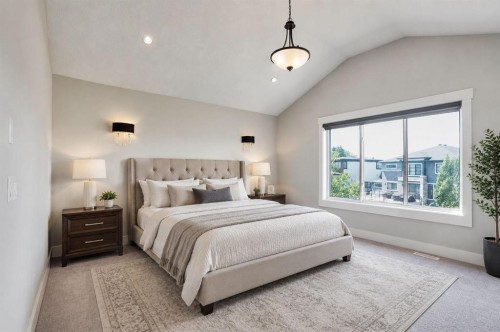 113 Kinniburgh Bay, Chestermere, AB - Indoor Photo Showing Bedroom