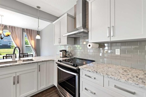 68 Nolanlake Point Nw, Calgary, AB - Indoor Photo Showing Kitchen With Upgraded Kitchen