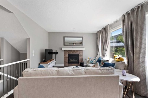 68 Nolanlake Point Nw, Calgary, AB - Indoor Photo Showing Living Room With Fireplace