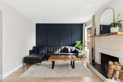 76 Ranchridge Way Nw, Calgary, AB - Indoor Photo Showing Living Room With Fireplace