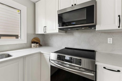 76 Ranchridge Way Nw, Calgary, AB - Indoor Photo Showing Kitchen
