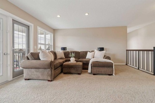 161 Heritage Bay, Cochrane, AB - Indoor Photo Showing Living Room