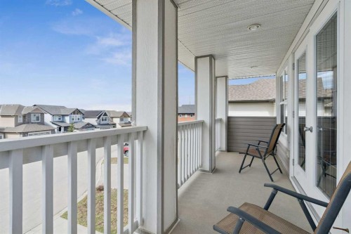 161 Heritage Bay, Cochrane, AB - Outdoor With Exterior