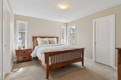 161 Heritage Bay, Cochrane, AB - Indoor Photo Showing Bedroom