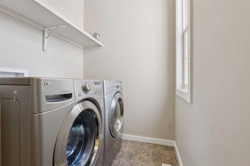 161 Heritage Bay, Cochrane, AB - Indoor Photo Showing Laundry Room
