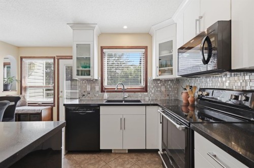 12 Valley Glen Heights Nw, Calgary, AB - Indoor Photo Showing Kitchen With Double Sink