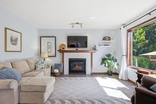 12 Valley Glen Heights Nw, Calgary, AB - Indoor Photo Showing Living Room With Fireplace