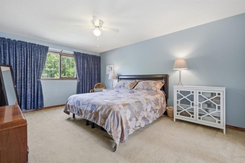 12 Valley Glen Heights Nw, Calgary, AB - Indoor Photo Showing Bedroom
