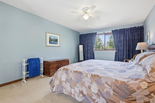 12 Valley Glen Heights Nw, Calgary, AB - Indoor Photo Showing Bedroom