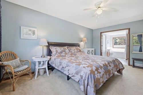 12 Valley Glen Heights Nw, Calgary, AB - Indoor Photo Showing Bedroom