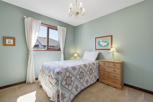 12 Valley Glen Heights Nw, Calgary, AB - Indoor Photo Showing Bedroom